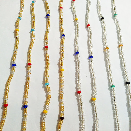 Title 8, Colored Glass Crystal Waist Chain. Enhance your...