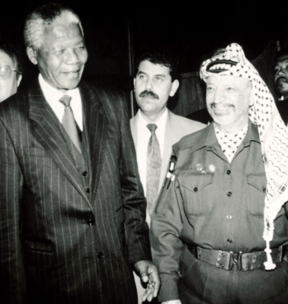 Former president Nelson Mandela with Palestine Liberation Organisation leader Yasser Arafat at the Union Buildings in Pretoria on May 10 1994.