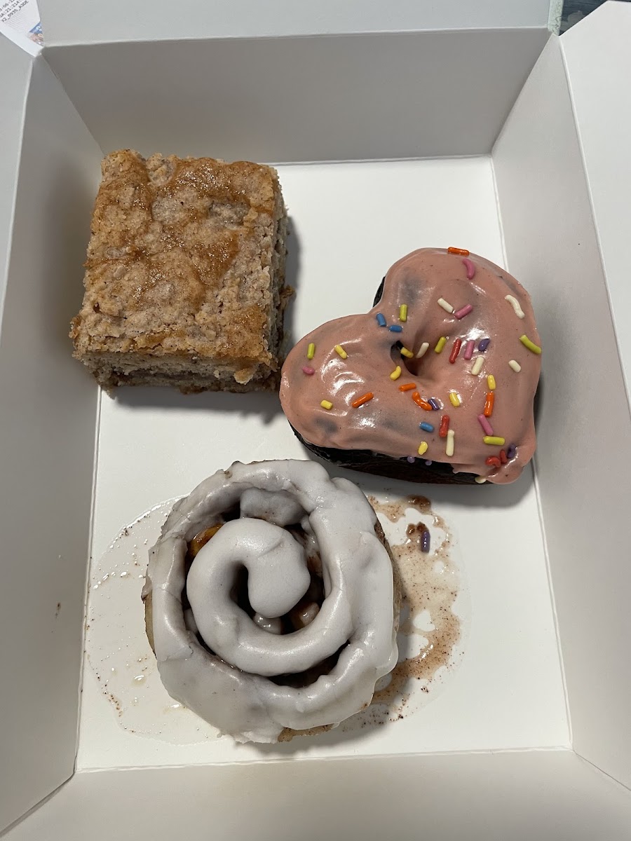 Coffee cake, chocolate strawberry donut, and apple cinnamon bun -- all DELICIOUS!