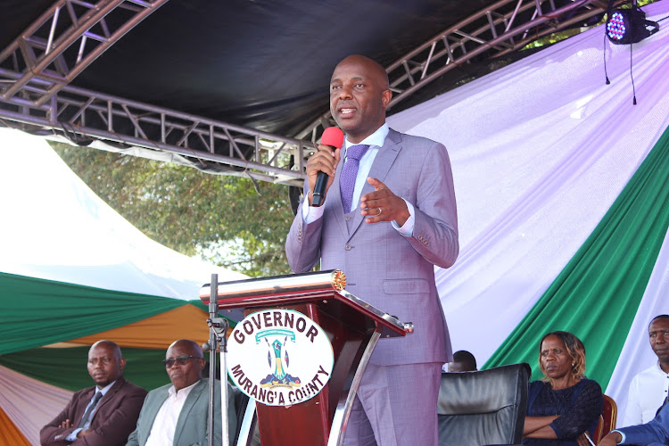 Murang'a Governor Irungu Kang'ata addresses community health volunteers at Gakoigo grounds on December 11, 2022