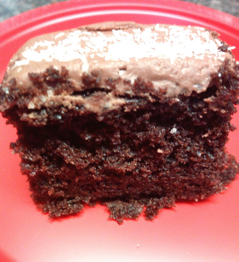 Betty's old fashioned boiled chocolate cake topped with chocolate frosting and coconut