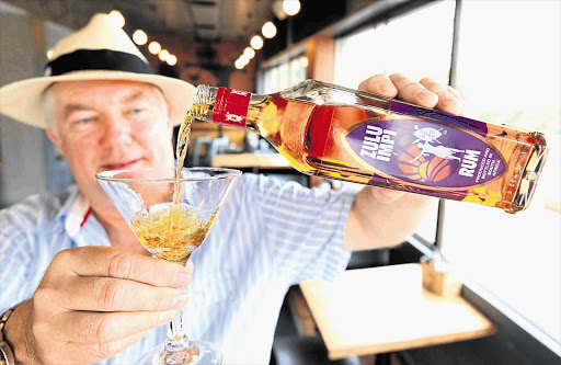 BARREL OF FUN: Clinton Wyness developed Zulu, South Africa's first rum, in three flavours