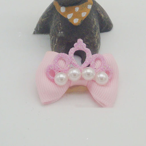 Title 4, Pet hair accessories featuring a flower head, e...