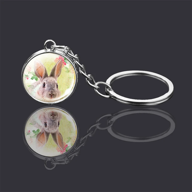 Chaveiro Enfeite Bola de Vidro Dupla Face com Animais. Decore suas chaves ou bolsa com este acessório charmoso e original.