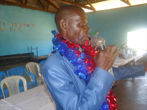 Pamoja Group Integrated Saving for Empowerment Sacco chairman Erick Were addressing group members at John Osogo secondary school in Port Victoria in Budalangi, Busia County during the graduation ceremony on Friday last week