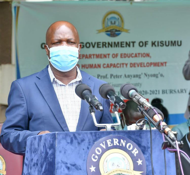 Kisumu Deputy Governor Mathews Owili during the launch of Sh45 million bursaries to needy students