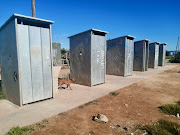 Kliprand residents have opted to use the bucket system instead of these communal flush toilets because of criminals. 