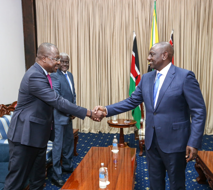 President William Ruto welcomes a member of African Union Commission (AUC) Chairperson Moussa Faki Mahamat's delegation.