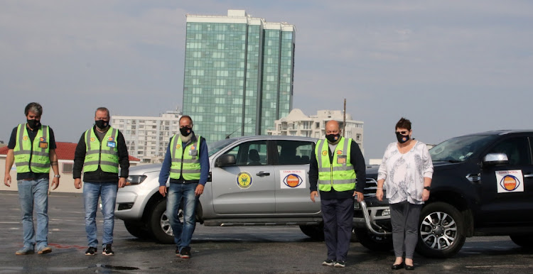 Heading the Summerstrand Neighbourhood Watch team are, from left, operations manager Brad Comley, chair Sean Tappan, vice-chair Pieter Binsbergen, marketing head Ian Millar and admin manager Gail Pullen. Residents can meet the team on Saturday during their marketing drive along the beachfront