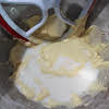 Thumbnail For Adding Flour And Milk To The Egg Mixture.