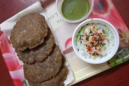 4 Kuttu Ki Poori With Fresh Aloo Raita, Green Chutney & Salad