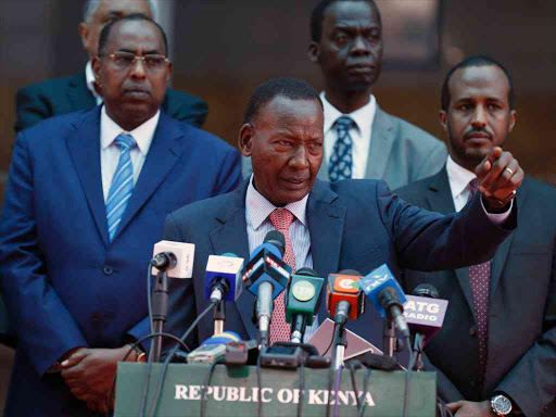 Interior CS Joseph Nkaissery (C) with Ambassador Gamal Mohamed Hassan (R) of UNEP and UNHabitat and UNHCR special envoy Mohammed Affey at Harambee House at a joint press conference on November 16, 2016. The Kenyan government announced six months extension of time for completion of repatriation and eventual closure of Dadaab Refugee Complex citing delicate situation in Somali and other factors. Photo/Jack Owuor