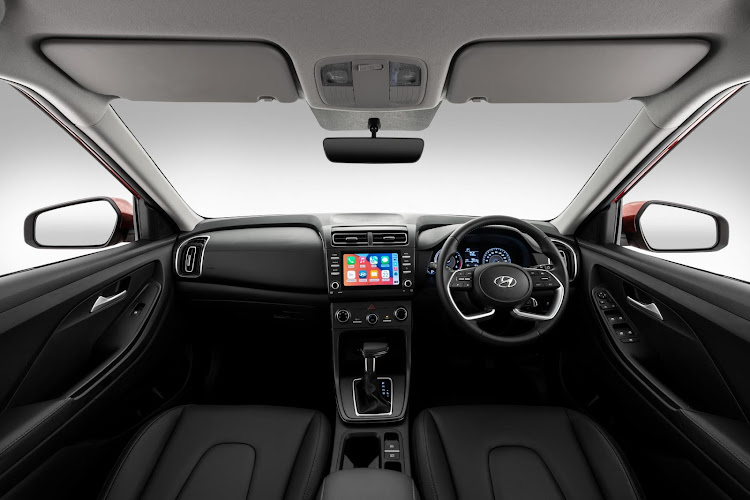 Eight-inch touchscreen infotainment system syncs wirelessly with Apple CarPlay and Android Auto.