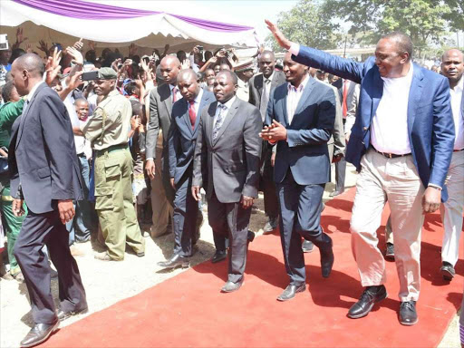 President Uhuru Kenyatta, Devolution CS Mwangi Kiunjuri, Laikipa Governor Joshua Irungu arrive at Nanyuki Stadium, Laikipia County for the homecoming of the CS.PICTURE REBECCA NDUKU/DPPS