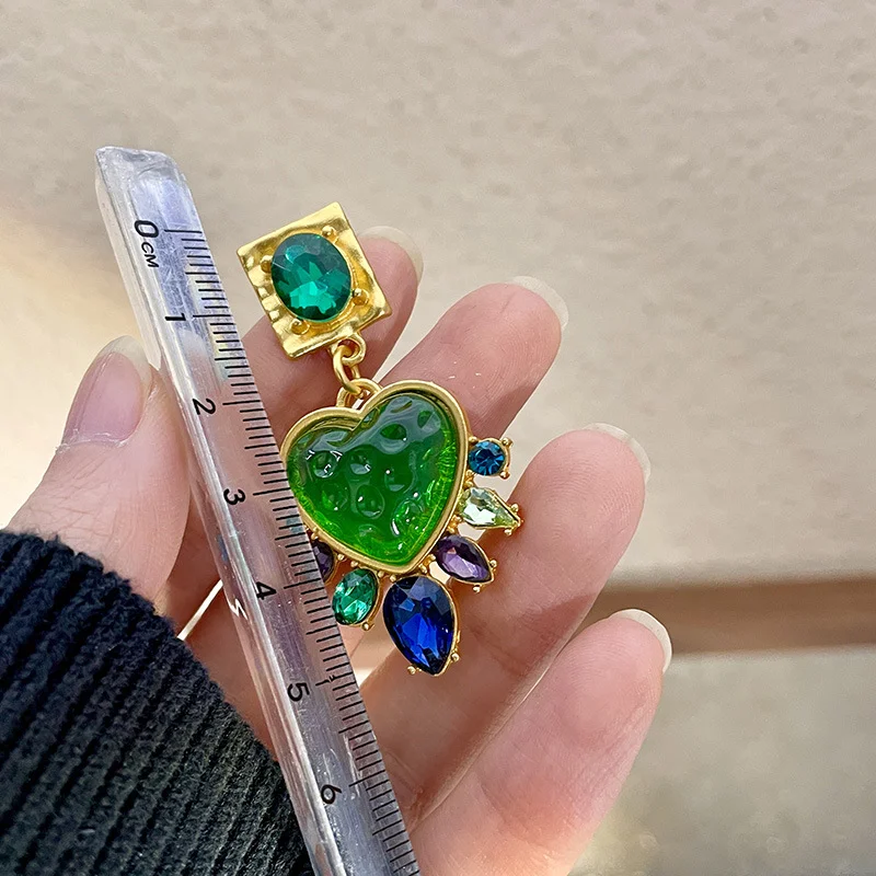 Vintage Heart-shaped Glass Stud Earrings in Mixed Colors add a touch of romance to any outfit, these earrings are perfec