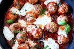 Turkey Meatballs in Spicy Tomato Basil Sauce with Burrata was pinched from <a href="http://www.ambitiouskitchen.com/2012/08/turkey-meatballs-in-spicy-tomato-basil-sauce-with-burrata/" target="_blank">www.ambitiouskitchen.com.</a>