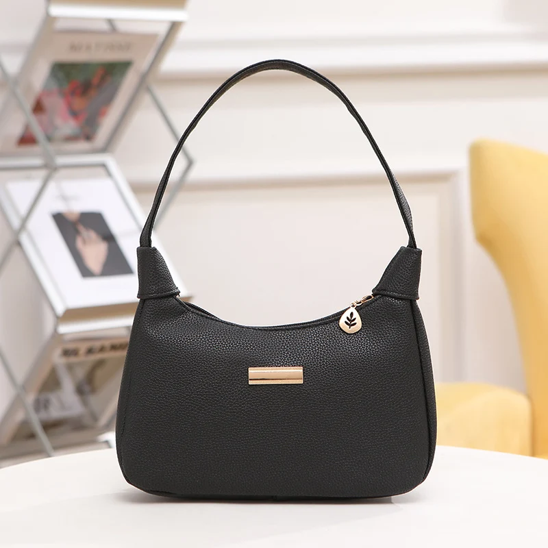 Bolsa de ombro feminina versátil e elegante para usar sob o braço. Combina com tudo, ideal para qualquer look e ocasião. Conforto e estilo.