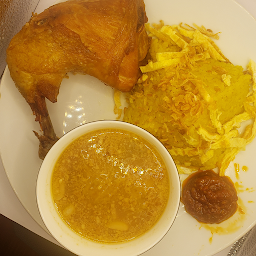 19 Yellow tumeric rice with fried chicken and sour soup