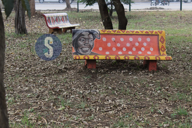 A sitting bench with a graffiti of the late Wangari Maathai at the newly renovated Uhuru park on September 11, 2023.