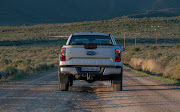 Tonneau cover would be useful. Without one you can't transport anything of value in the load box. 