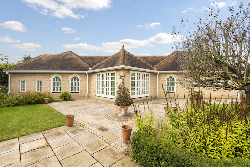 Buy this luxury house in Huntingdon (United Kingdom) - Brick house, paved terrace, green garden
