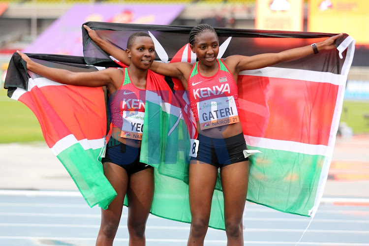Zenah Yego and Teresiah Gateri celebrate their win during the world Athletics U20 championships being held at the Moi International Stadium Kasarani on August 19, 2021.