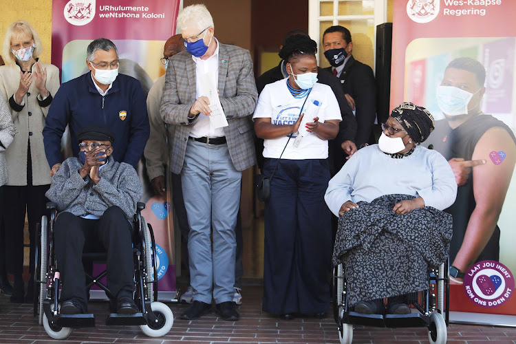 Desmond Tutu and his wife Leah were among Western Cape senior citizens who were vaccinated on Monday. With them are Western Cape Premier Alan Winde and Health MEC Nomafrench Mbombo.