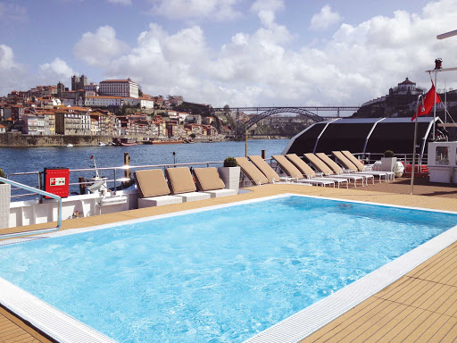 Take a dip in the pool on the sun deck of Uniworld's Queen Isabel. 