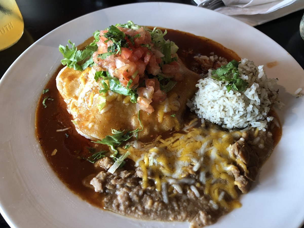 Chicken enchilada with rice and beans. Delicious!!