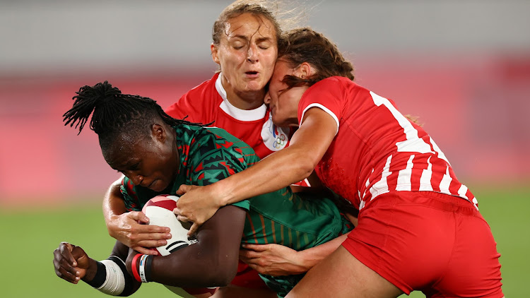 Janet Okelo of Kenya scores a try against ROC