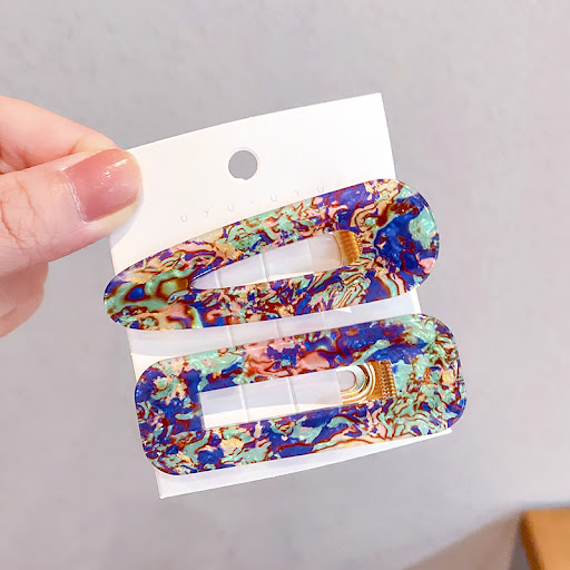 Title 11, Korean Girl With Broken Hair Side Clip, a styli...