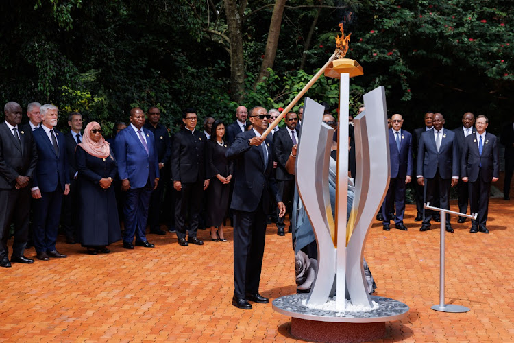 The President of Rwanda, Paul Kagame, lights a flame to start of 100 days of remembrance as Rwanda commemorates the 30th anniversary of the Tutsi genocide on April 7, 2024 in Kigali, Rwanda. During a roughly 100-day period in 1994, hundreds of thousands of members of the Tutsi ethnic group were killed by Hutu militias, during the country's civil war.