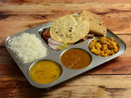 Rice Plate (Thali With Roti) Includes:-3 Roti, 2 Sabji, Dal, Rice, Papad