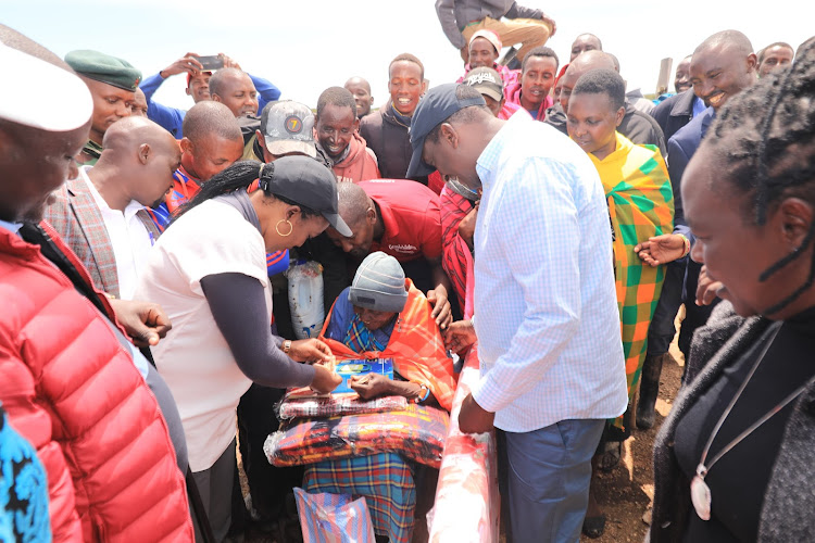 Environment, Climate Change and Forestry Cabinet Secretary Soipan Tuya gives donations to people displaced by floods in Narok County on May 6, 2024.