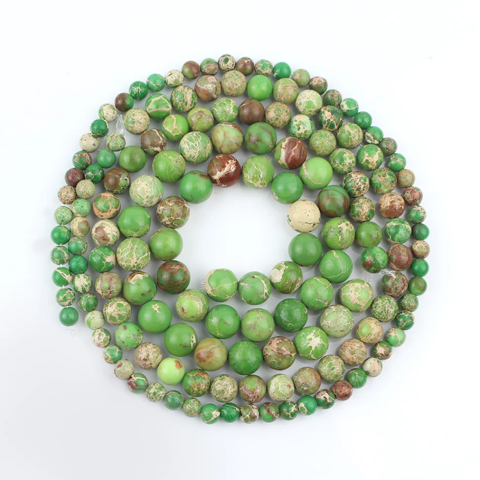 Groene Keizersteen losse kralen voor DIY armbanden en kettingen. Ronde, gebarsten kralen, handgemaakt. Verwerkingsmateriaal.
