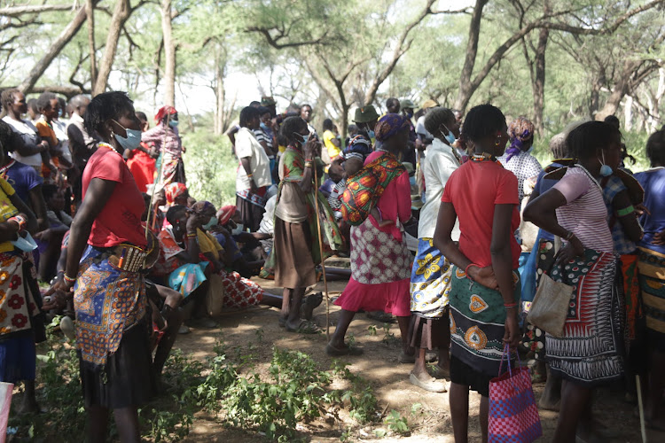 Women gather during commissioning of the transfer fund program.