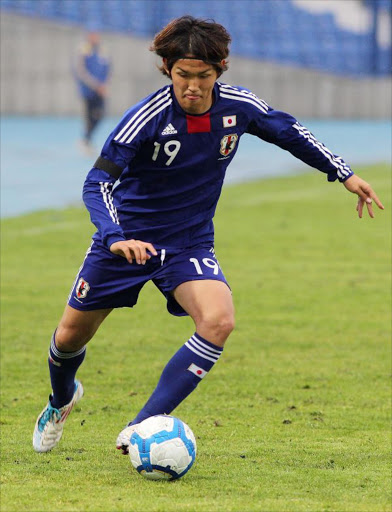 Takashi Usami of Japan in action during the U-22 friendly match between Japan and Uzbekistan at Pakhtakor stadium on March 26, 2011 in Tashkent, Uzbekistan