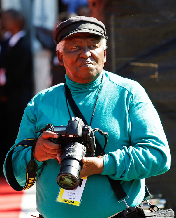 Photojournalist Peter Magubane looks on during the funeral of Albertina Sisulu in Johannesburg on June 11 2011. File image.