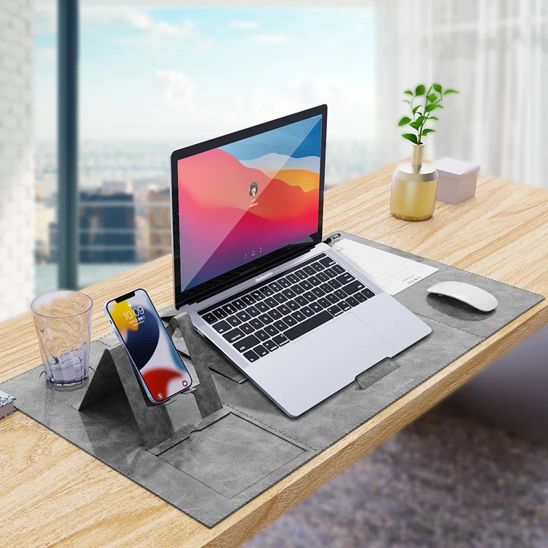Nieuwe multifunctionele notebook muismat. Comfortabel typen, georganiseerde ruimte, polssteun en veelzijdig gebruik. Verbeter je workflow met deze handige accessoire.