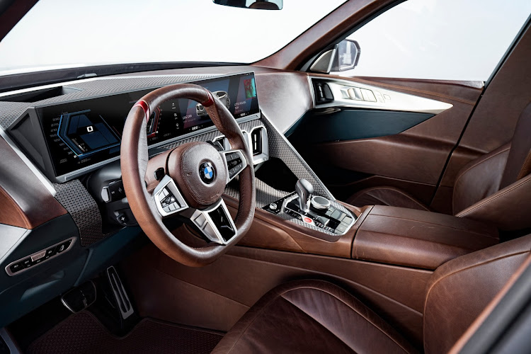 The car debuts a curved multimedia display that will be used in future luxury BMWs. Picture: SUPPLIED