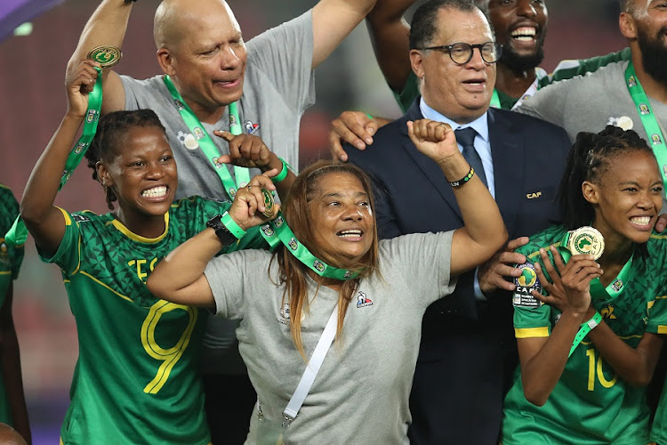 Coach Desiree Ellis and SA Football Association president Danny Jordaan celebrate the win.