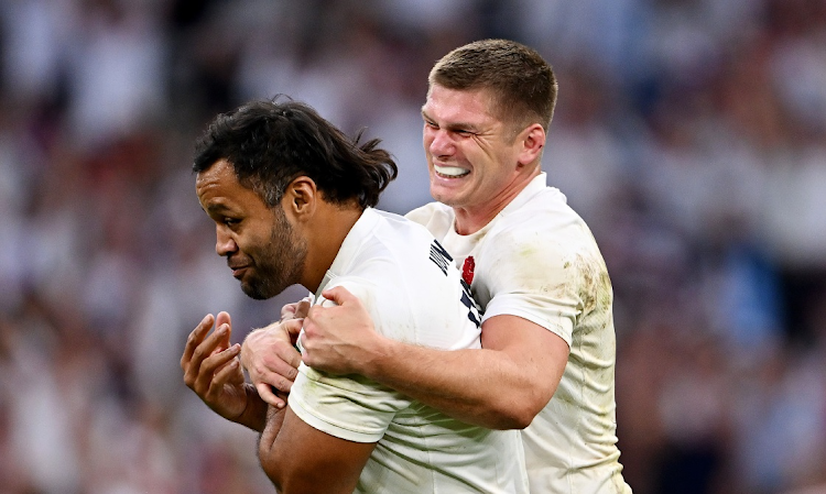 Billy Vunipola and Owen Farrell of England celebrate victory at full-time after the Rugby World Cup quarterfinal against Fiji at Stade Velodrome in Marseille on Sunday.