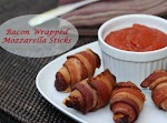 Bacon Wrapped Mozzarella Sticks – Low Carb and Keto Recipe was pinched from <a href="http://eatfatlosefatblog.com/bacon-wrapped-mozzarella-sticks-low-carb-and-keto-recipe/" target="_blank">eatfatlosefatblog.com.</a>