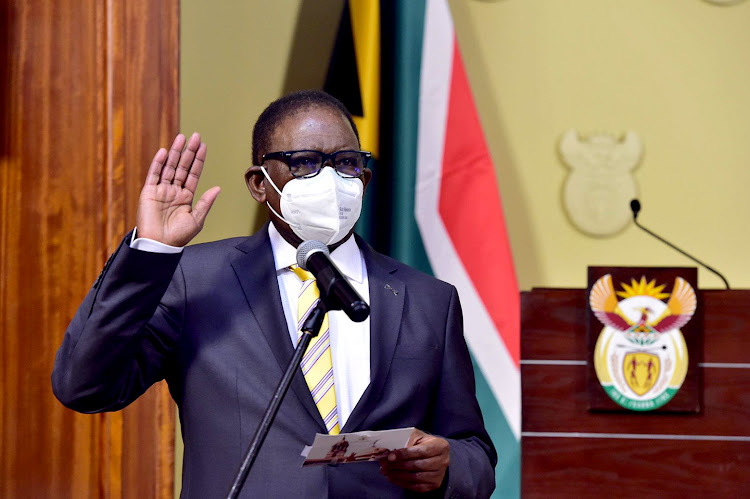 Enoch Godongwana being sworn in as the minister of finance on August 6 2021.