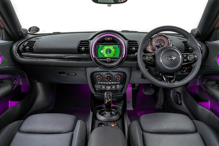 A huge centrally-mounted infotainment system dominates the interior.