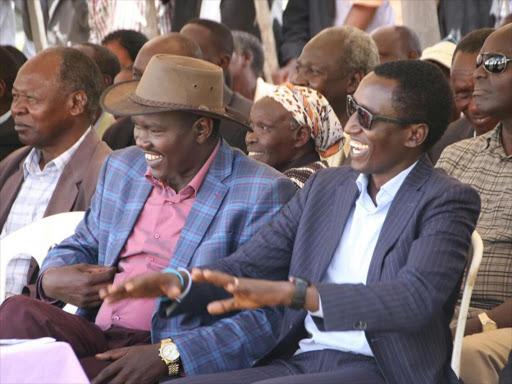 Uasin Gishu governor-elect Jackson Mandago and his competitor in last week's polls Bundotich Kiprop when they shared a podium at a funeral in Kesses, Tuesday, August 15, 2017. /MATHEWS NDANYI