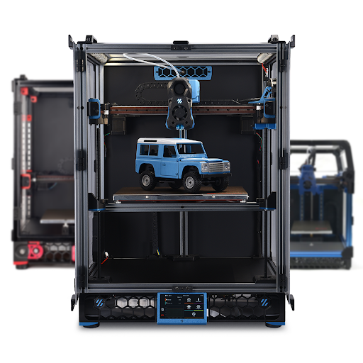 Image of fully assembled Voron Core XY 3D printers with the Voron Trident at the forefront, the Voron 2.4 on the back left, and the Voron 0.1 on the back right 