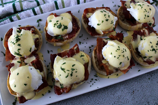 A platter of Eggs Benedict.