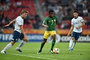 Promise Mkhuma of South Africa is challenged by Pedro De La Vega of Argentina during the 2019 FIFA U-20 World Cup group F match between Argentina and South Africa at Tychy Stadium on May 25, 2019 in Tychy, Poland. 