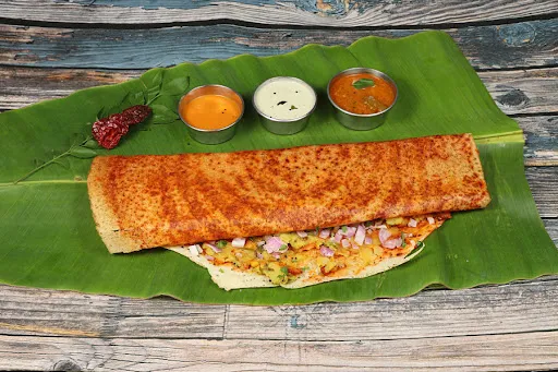 Ghee Schezwan Masala Onion Dosa